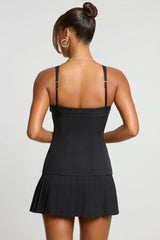 Brushed Twill Drop Waist Kilt Mini Dress in Black