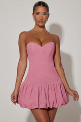 Cut-Out Bubble Hem Corset Mini Dress in Dusty Pink